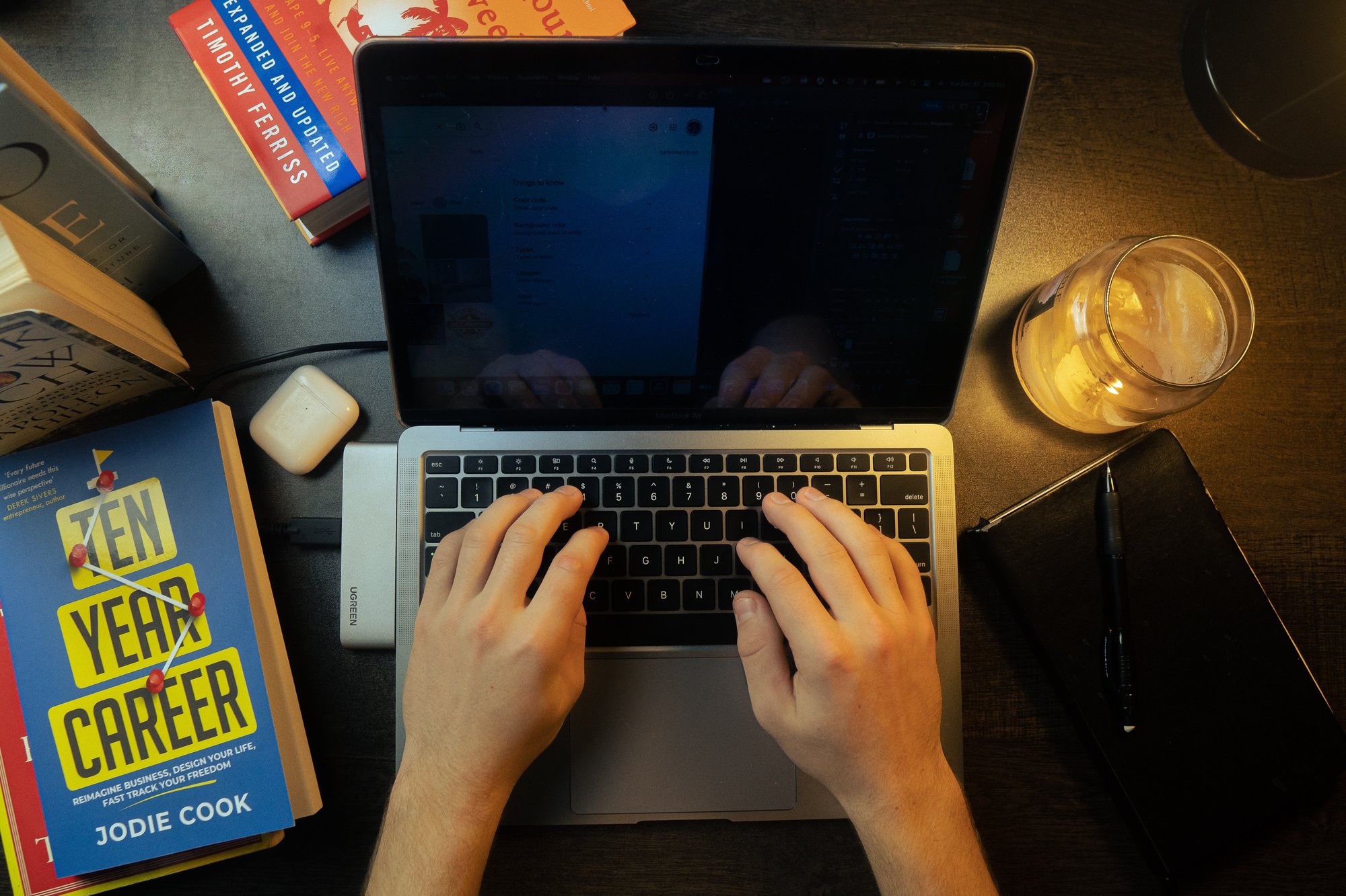 person typing on a laptop