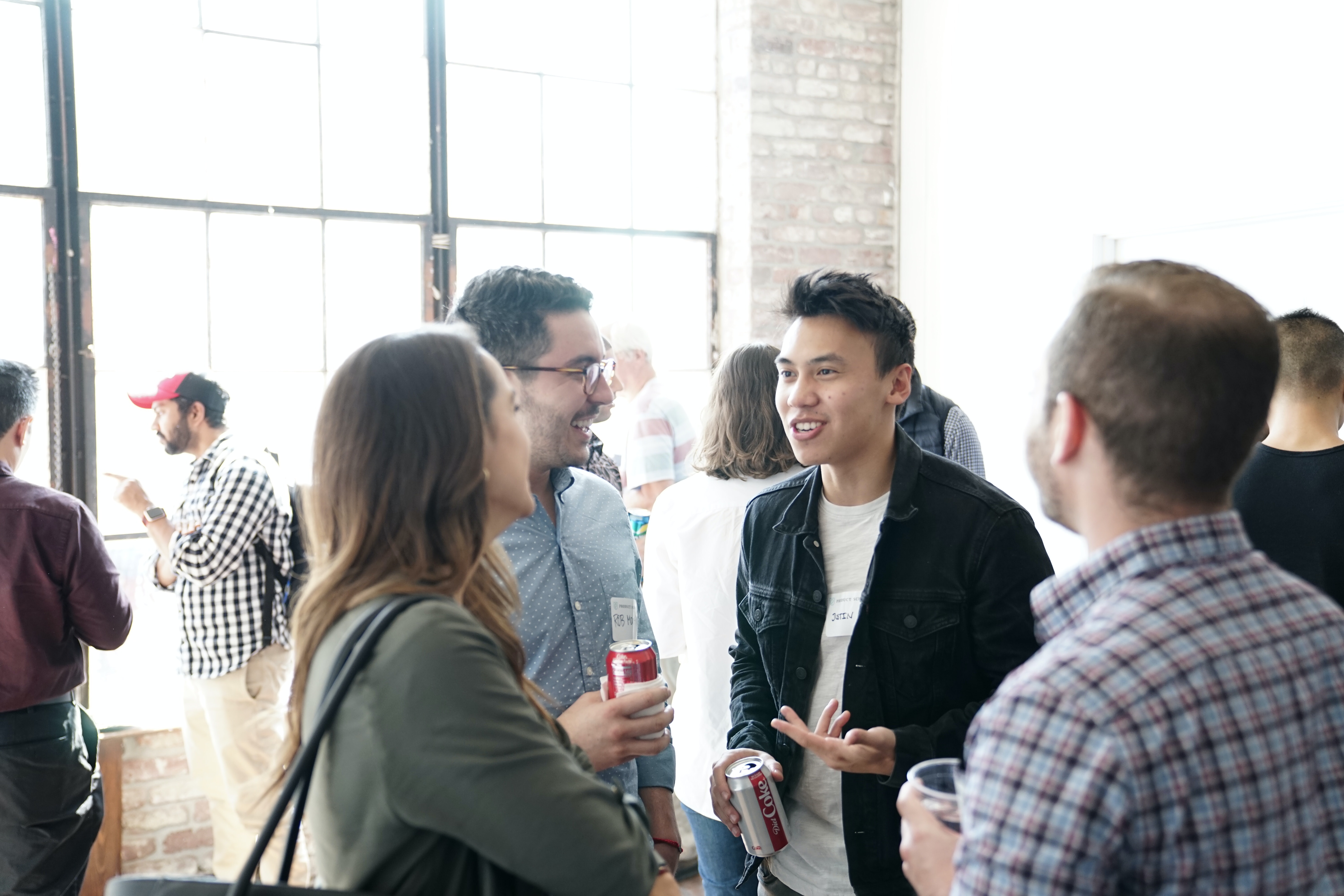 Group of people discussing at an event