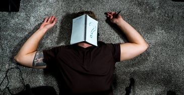 A man struggling with writer's block