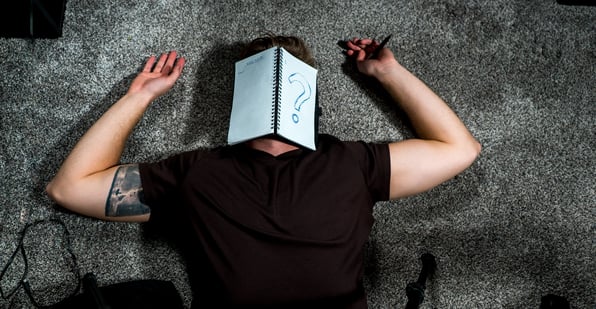 A man struggling with writer's block
