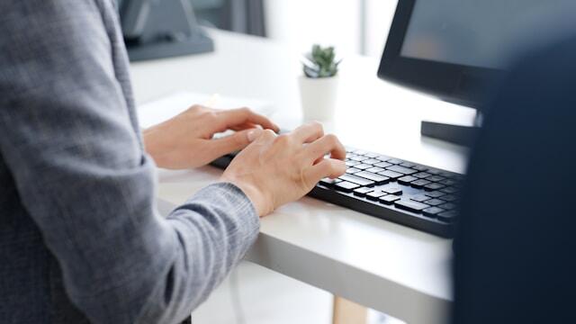 typing on laptop typing on laptop